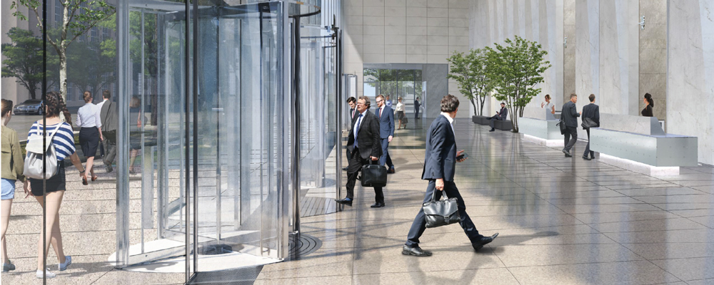 Tenants use revolving doors at entrance of 320 S Canal